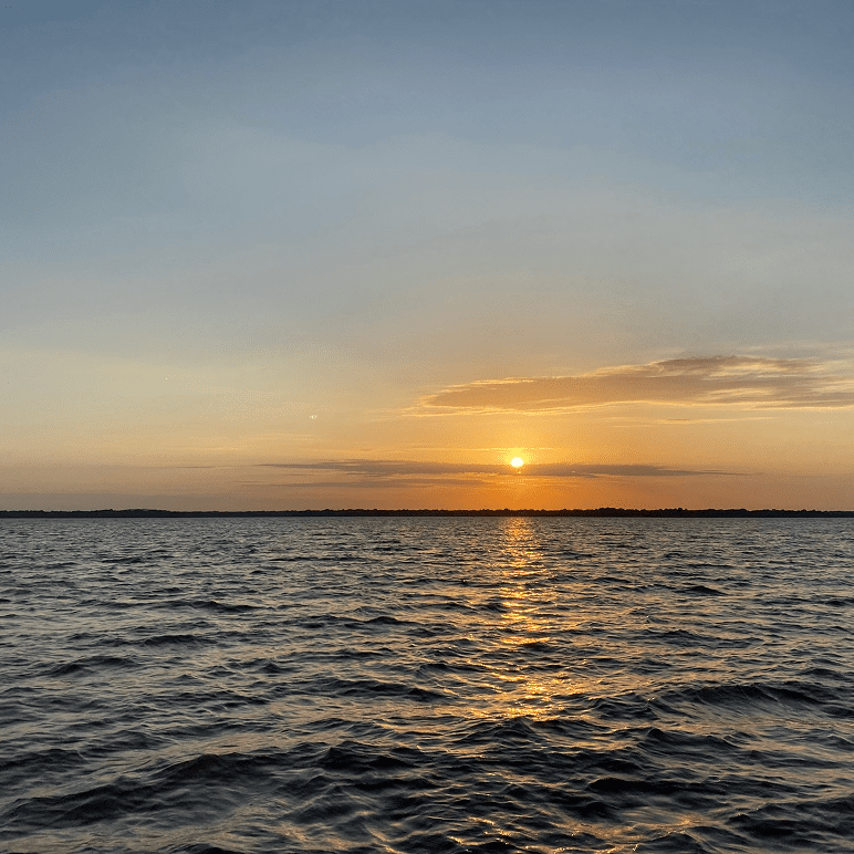 Golden sunset reflecting on water