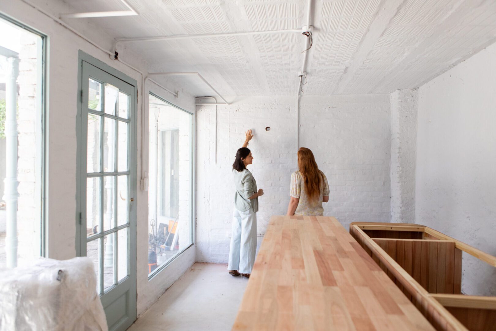 Female architects reviewing ideas for renovation project - Buenos Aires - Argentina